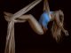 Girls performing acrobatic circus skills on ribbon