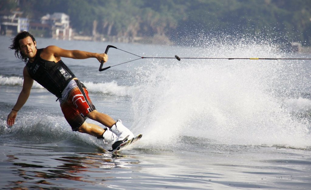 Mam wakeboarding on a lake