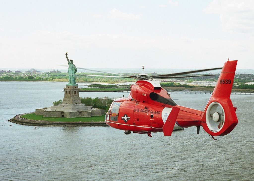 Helicopter flight experience day flying over the Statue of Liberty New York City