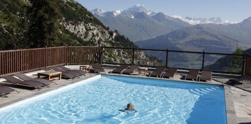 Relaxing in pool in French Alps