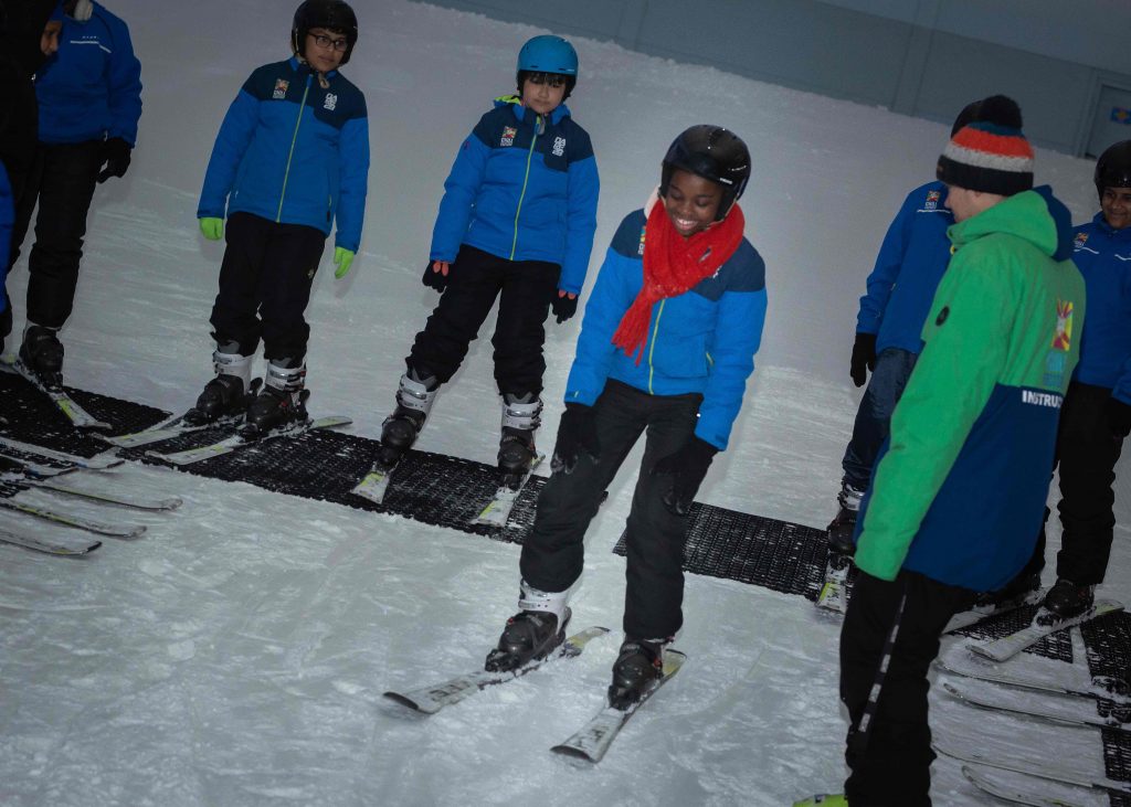 Learning to ski on snow